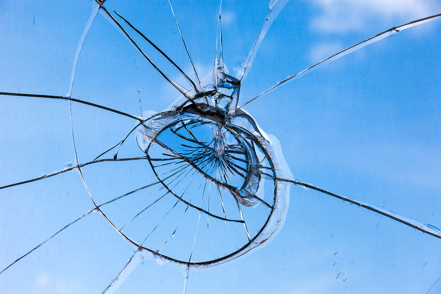 Closeup of a crack in a windshield